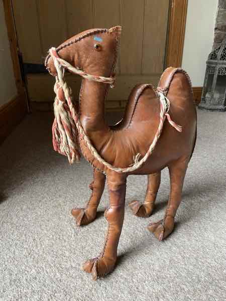 An old leather camel dating from WW2 that has been re-stitched